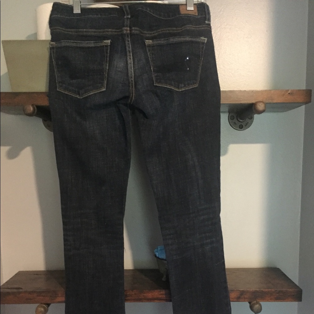 AE. Size 6. Reg. Dark wash. Skinny kick. Stretch.